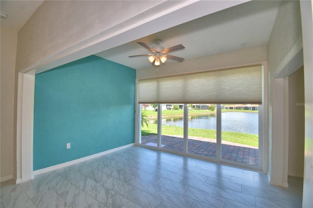4188 Muirfield Loop, Lake Wales, FL 33859 - unfurnished room with a water view and ceiling fan