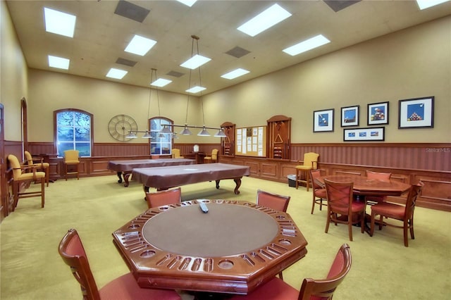 4188 Muirfield Loop, Lake Wales, FL 33859 - rec room with carpet floors, a wainscoted wall, a towering ceiling, billiards table, and a decorative wall