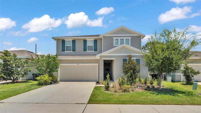 1125 Mattie Pointe Blvd, Auburndale, FL 33823 - view of front of home featuring a garage, concrete driveway, a front yard, and stucco siding