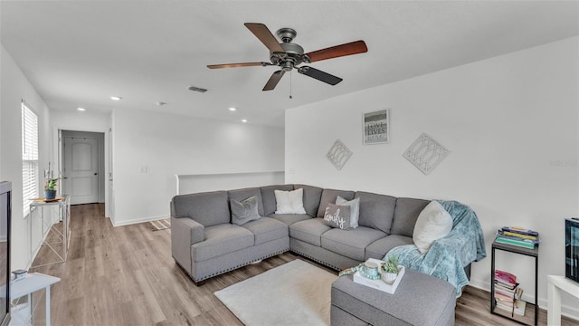1125 Mattie Pointe Blvd, Auburndale, FL 33823 - living area with a ceiling fan, light wood-style floors, and recessed lighting
