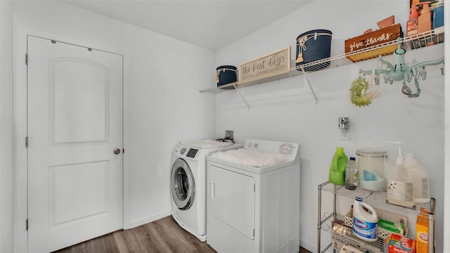 1125 Mattie Pointe Blvd, Auburndale, FL 33823 - laundry room featuring washer and dryer and wood finished floors