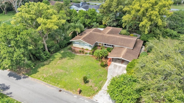 4219 Forest Hills Dr, Lakeland, FL 33813 - aerial view of property and surrounding area with a tree filled landscape