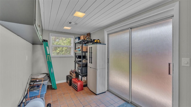 4219 Forest Hills Dr, Lakeland, FL 33813 - laundry room with light tile patterned flooring