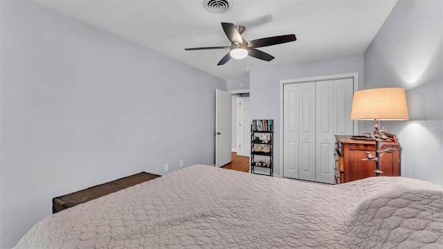 4219 Forest Hills Dr, Lakeland, FL 33813 - bedroom featuring a closet, ceiling fan, and wood finished floors