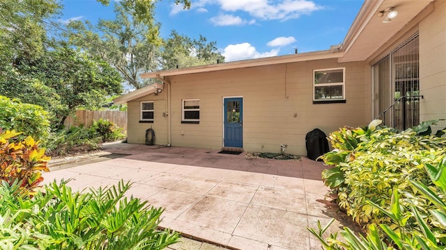 4219 Forest Hills Dr, Lakeland, FL 33813 - back of house with a patio area