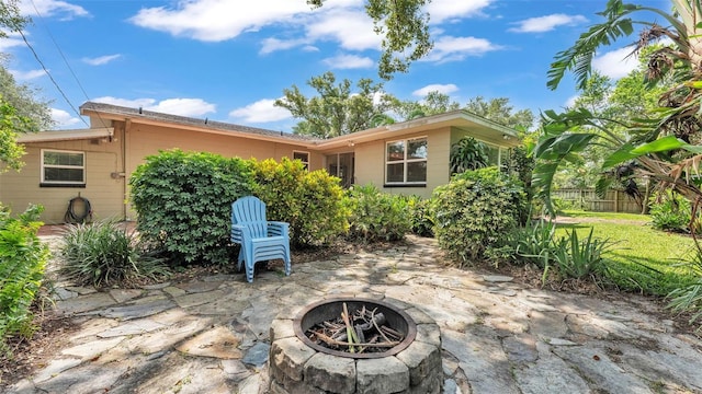 4219 Forest Hills Dr, Lakeland, FL 33813 - view of patio with a fire pit