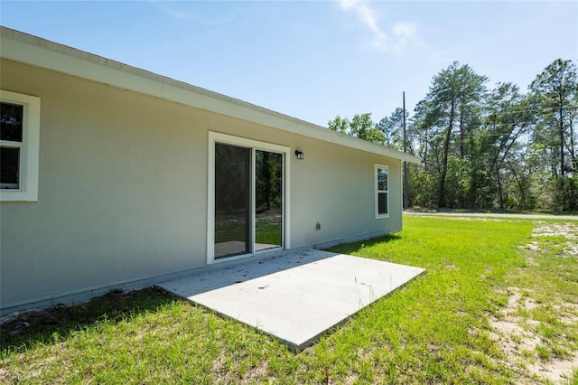 200 Locust Pass, Ocala, FL 34472 - view of green lawn with a patio