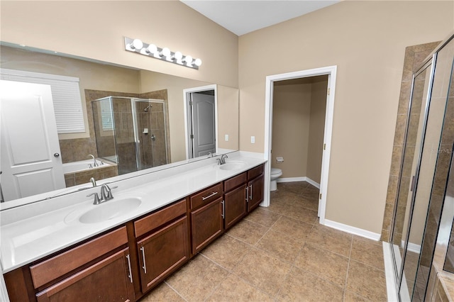228 Magneta Loop, Auburndale, FL 33823 - full bathroom featuring a shower stall, double vanity, a garden tub, and tile patterned flooring