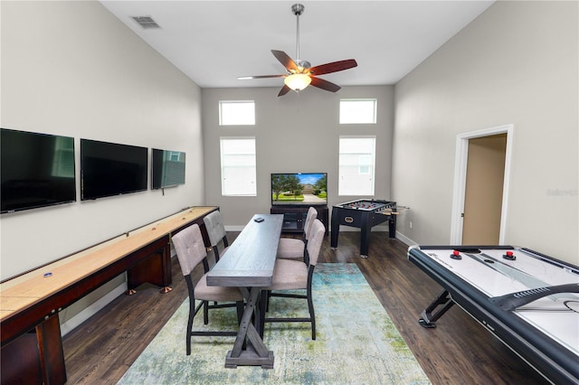228 Magneta Loop, Auburndale, FL 33823 - game room featuring ceiling fan, wood finished floors, and a towering ceiling