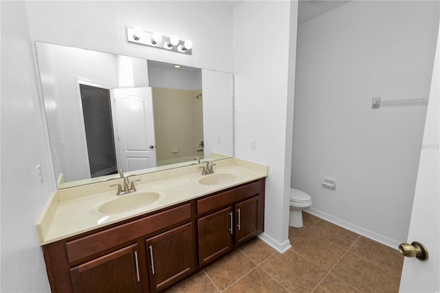 228 Magneta Loop, Auburndale, FL 33823 - bathroom with double vanity, tile patterned flooring, and a shower