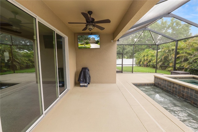 228 Magneta Loop, Auburndale, FL 33823 - view of patio / terrace with a ceiling fan, an in-ground hot tub, and a lanai