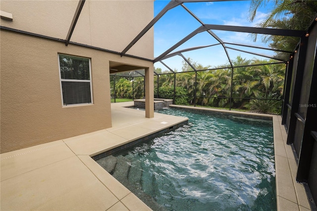 228 Magneta Loop, Auburndale, FL 33823 - view of swimming pool featuring a patio area, a pool with connected hot tub, and a lanai