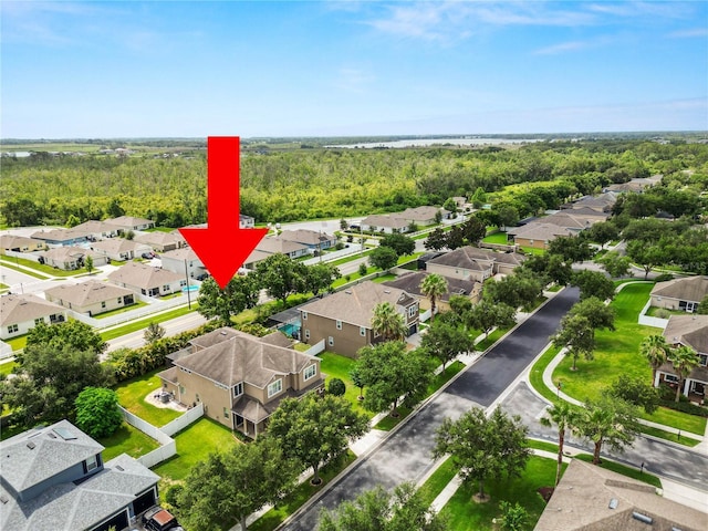 228 Magneta Loop, Auburndale, FL 33823 - aerial view of residential area with a heavily wooded area