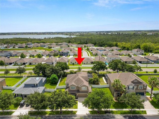 228 Magneta Loop, Auburndale, FL 33823 - aerial perspective of suburban area with a large body of water