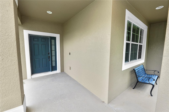 228 Magneta Loop, Auburndale, FL 33823 - doorway to property with stucco siding