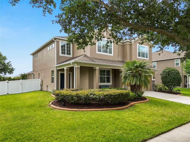228 Magneta Loop, Auburndale, FL 33823 - view of front of home featuring stucco siding, a gate, driveway, and a garage