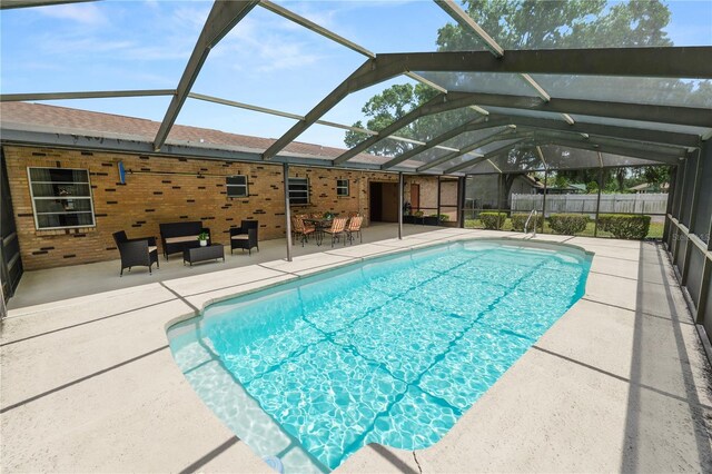 3315 Cross Fox Dr, Mulberry, FL 33860 - view of swimming pool featuring a patio, glass enclosure, and outdoor lounge area