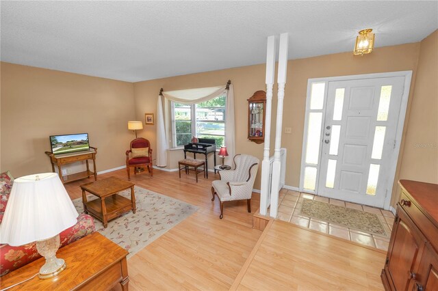 3315 Cross Fox Dr, Mulberry, FL 33860 - entryway with light wood-style flooring and baseboards