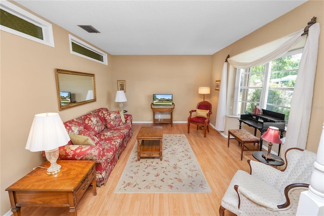 3315 Cross Fox Dr, Mulberry, FL 33860 - living area with wood finished floors and baseboards