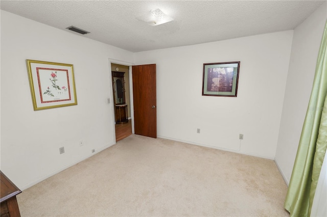 3315 Cross Fox Dr, Mulberry, FL 33860 - spare room with light colored carpet and a textured ceiling