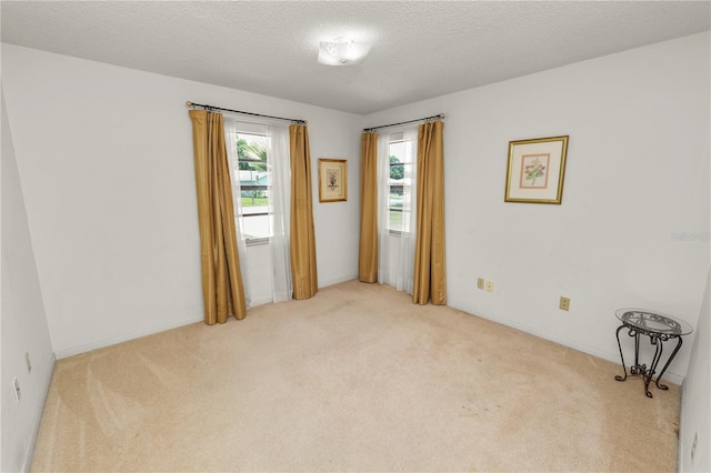 3315 Cross Fox Dr, Mulberry, FL 33860 - carpeted spare room featuring a textured ceiling and baseboards