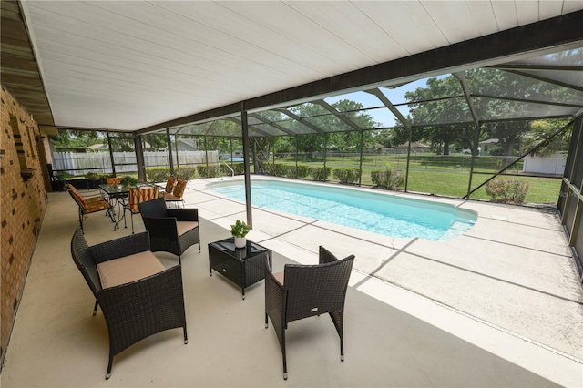 3315 Cross Fox Dr, Mulberry, FL 33860 - view of swimming pool with a patio, a fenced backyard, and glass enclosure