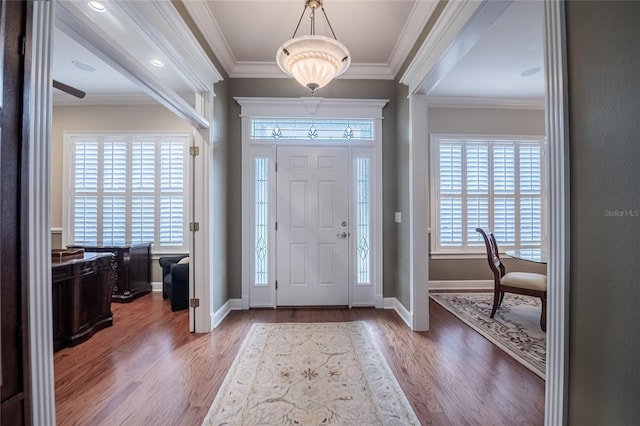 1589 Royal Forest Ct, Lakeland, FL 33811 - foyer entrance featuring wood finished floors and crown molding