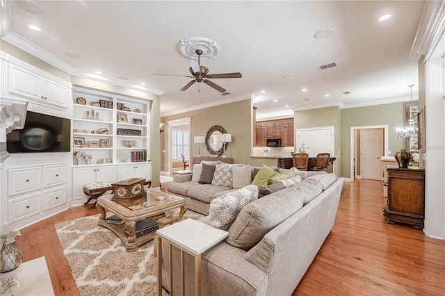 1589 Royal Forest Ct, Lakeland, FL 33811 - living room with ceiling fan, light wood-style flooring, recessed lighting, and crown molding