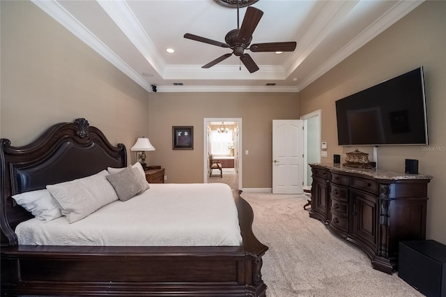 1589 Royal Forest Ct, Lakeland, FL 33811 - bedroom featuring a tray ceiling, light carpet, crown molding, and ceiling fan