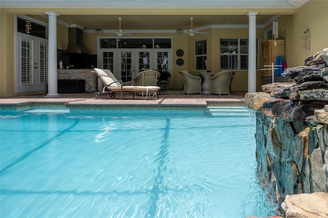 1589 Royal Forest Ct, Lakeland, FL 33811 - outdoor pool featuring ceiling fan, french doors, and a patio area