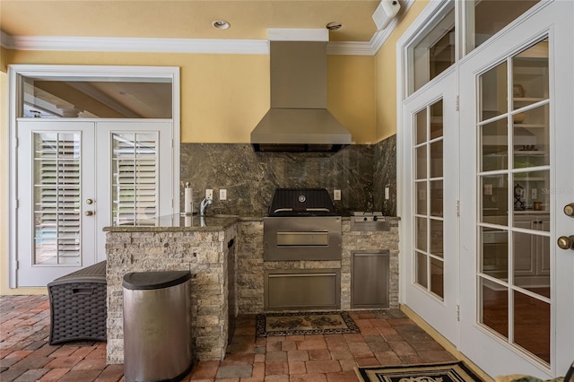 1589 Royal Forest Ct, Lakeland, FL 33811 - view of patio / terrace featuring french doors and exterior kitchen