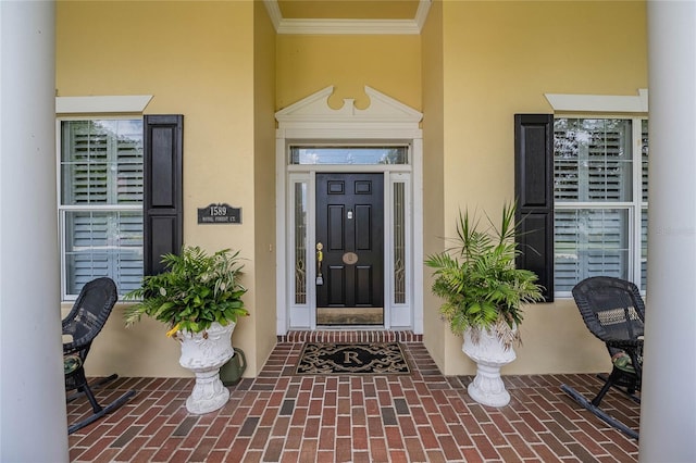 1589 Royal Forest Ct, Lakeland, FL 33811 - entrance to property featuring stucco siding and covered porch