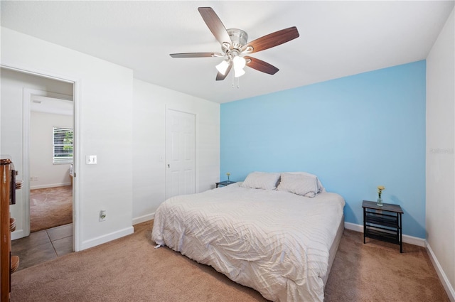 6507 Shadowbrook Run, Lakeland, FL 33813 - bedroom with carpet flooring, a ceiling fan, and a closet