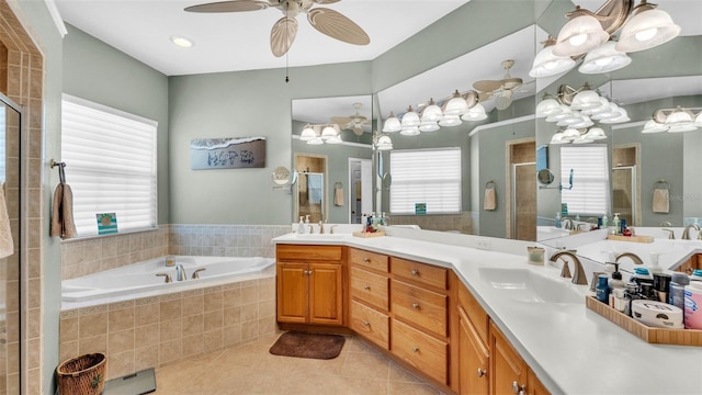 2817 High Winds Ln, Lakeland, FL 33813 - bathroom with tile patterned flooring, double vanity, a shower stall, and a bath