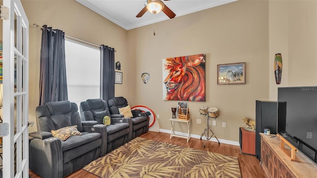 2817 High Winds Ln, Lakeland, FL 33813 - living area with ceiling fan, wood finished floors, and ornamental molding