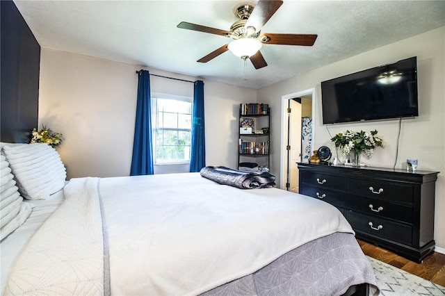 6920 Newman Cir E, Lakeland, FL 33811 - bedroom with a ceiling fan and baseboards