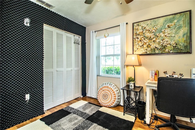 6920 Newman Cir E, Lakeland, FL 33811 - home office featuring ceiling fan and wood finished floors