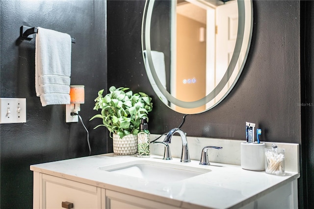 6920 Newman Cir E, Lakeland, FL 33811 - bathroom with vanity and a textured wall