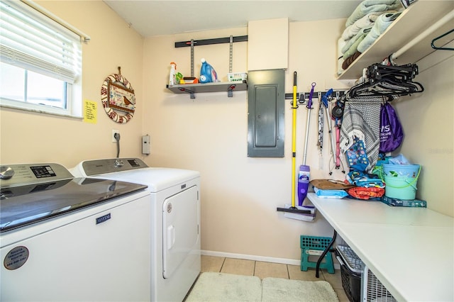 6920 Newman Cir E, Lakeland, FL 33811 - laundry room with electric panel, separate washer and dryer, and light tile patterned floors
