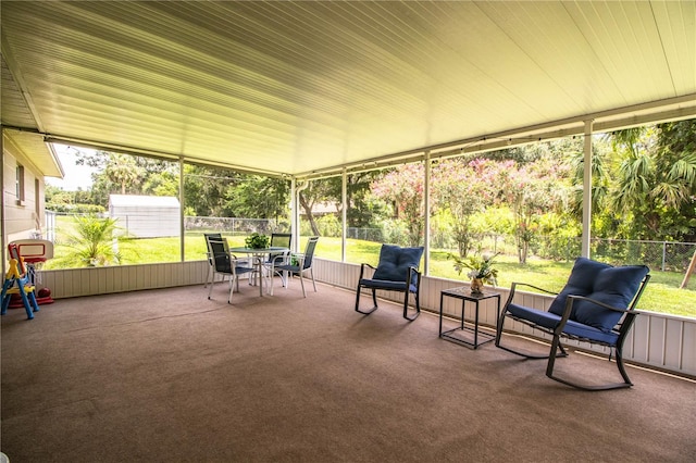 6920 Newman Cir E, Lakeland, FL 33811 - sunroom with outdoor dining space