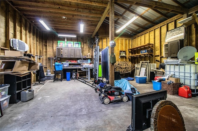 6920 Newman Cir E, Lakeland, FL 33811 - garage featuring a workshop area
