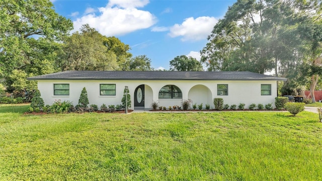 3235 Sandpiper Ln, Mulberry, FL 33860 - ranch-style home featuring a front lawn