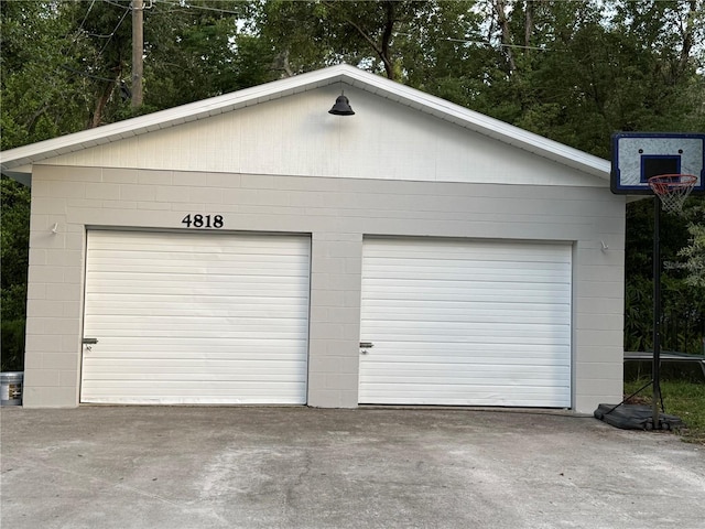 4818 Huron St, Zephyrhills, FL 33541 - detached garage with view of scattered trees