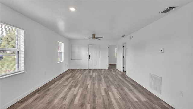 1050 Reynolds Rd, Lakeland, FL 33801 - empty room featuring wood finished floors, ceiling fan, and recessed lighting