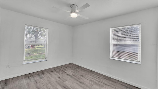 1050 Reynolds Rd, Lakeland, FL 33801 - spare room featuring wood finished floors and a ceiling fan
