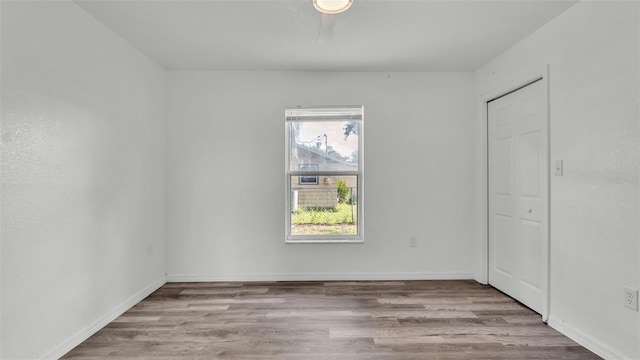 1050 Reynolds Rd, Lakeland, FL 33801 - unfurnished room with wood finished floors and ceiling fan