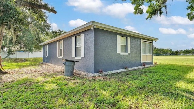 1050 Reynolds Rd, Lakeland, FL 33801 - view of property exterior with stucco siding