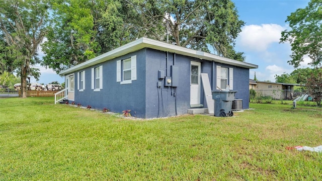 1050 Reynolds Rd, Lakeland, FL 33801 - view of home's exterior featuring stucco siding