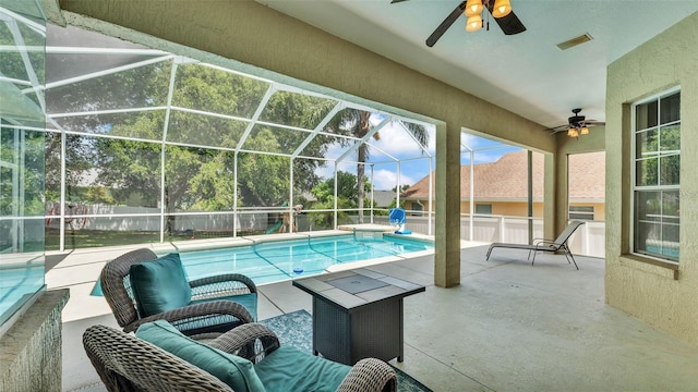 6757 High Grove Dr, Lakeland, FL 33813 - view of swimming pool featuring a ceiling fan, a patio area, and glass enclosure