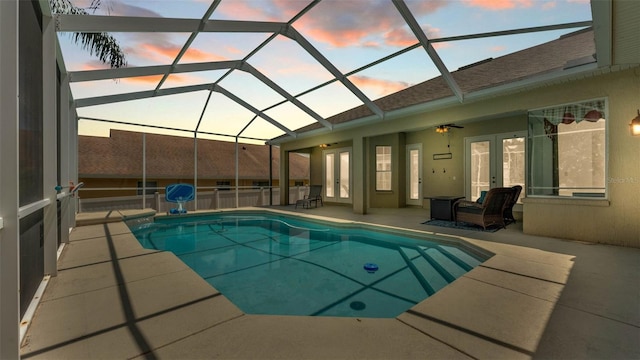 6757 High Grove Dr, Lakeland, FL 33813 - swimming pool featuring french doors, a patio area, and glass enclosure